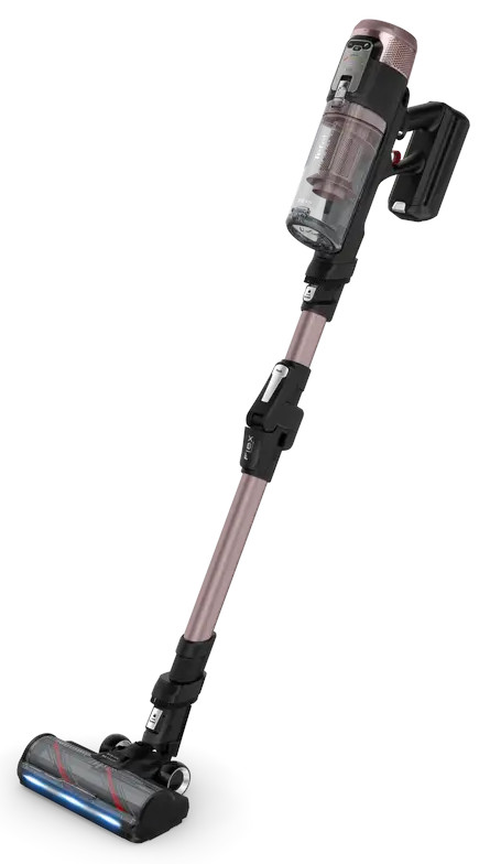 Bezprzewodowy odkurzacz z różowo-złotym korpusem i czarnymi akcentami. Głowica jest na ziemi, skierowana w górę. Tło jest białe.