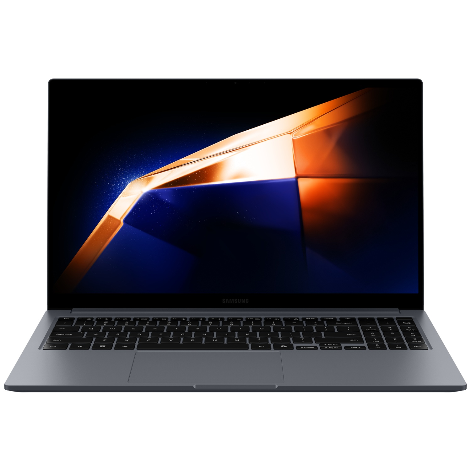 A Samsung laptop is displayed. The screen shows a dark abstract design. The keyboard is visible, and the laptop is on a white surface.
