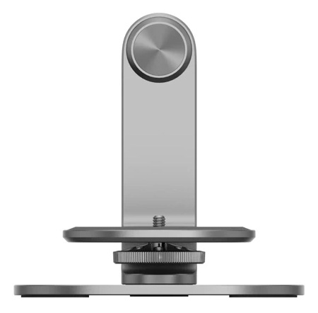 Srebrny metalowy stojak na telefon. Ma pionowy słupek z okrągłą górą i podstawą z mechanizmem obrotowym.