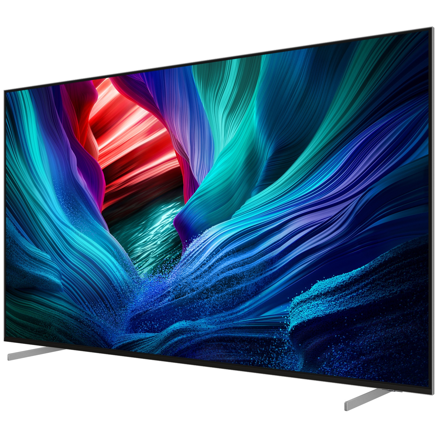Grote flatscreen-tv met een kleurrijk abstract display. Het scherm toont vloeiende patronen van rood, blauw en groen. Zilveren standaard.