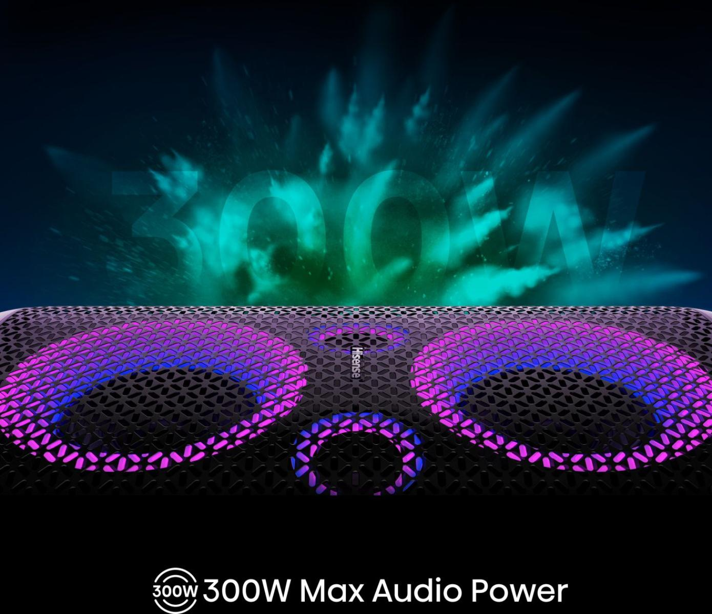 Egy fekete hangszóró lila és kék fényekkel. A háttérben zöld és türkiz fényrobbanás látható. A szöveg 300W Max Audio Power.