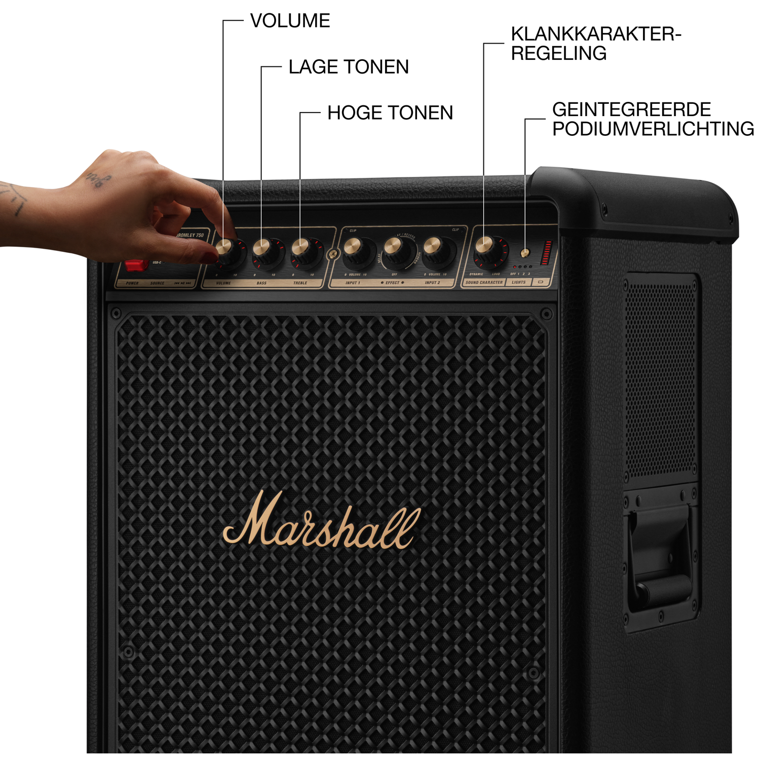 A hand adjusts a black Marshall speaker's volume knob. Text labels include volume, bass, treble, and sound character.