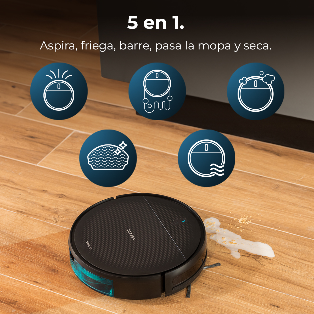 Una aspiradora robot negra sobre suelo de madera. Tiene iconos de modos de limpieza y texto en español.