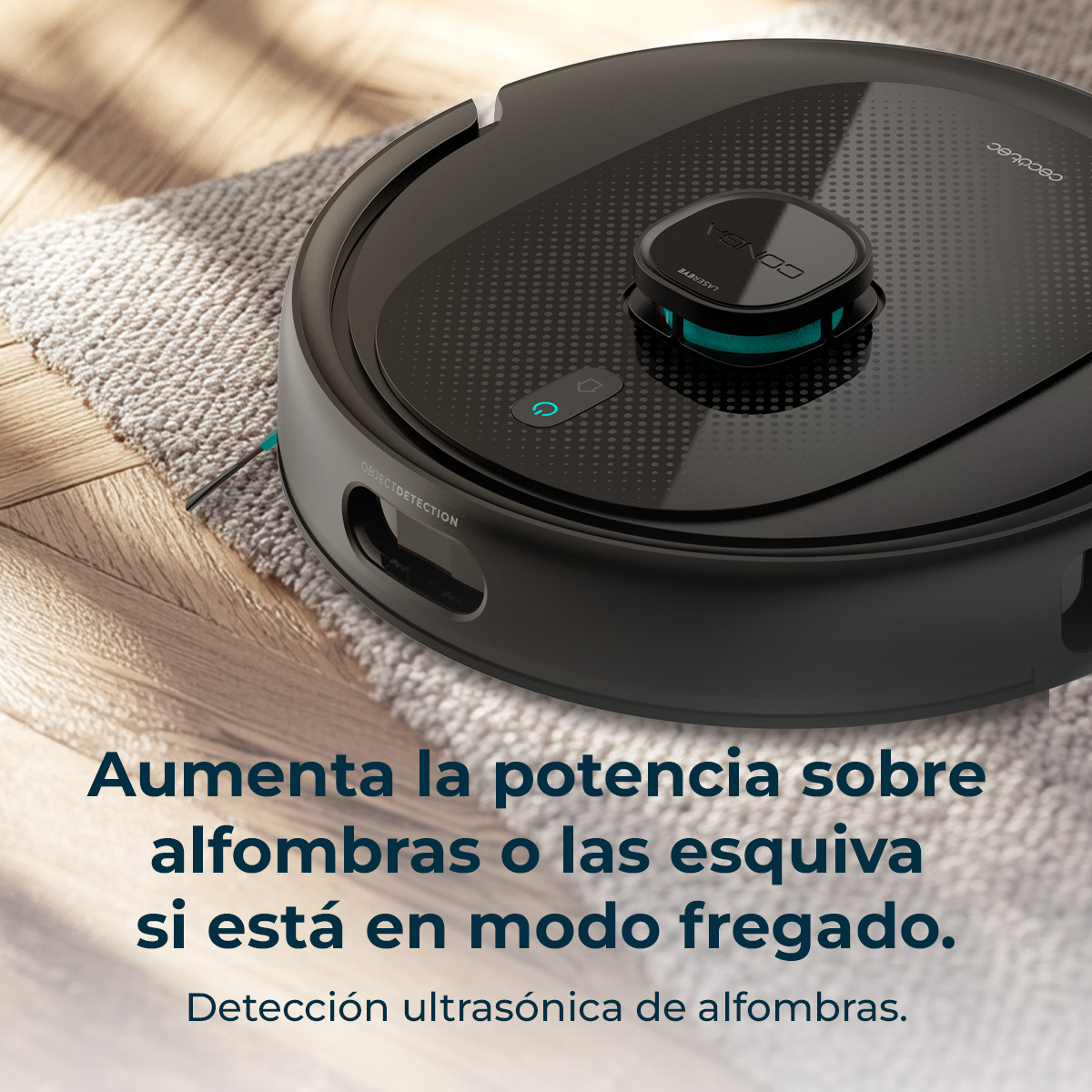 Una aspiradora robot negra sobre una alfombra. Tiene un sensor láser y detección de objetos. El texto dice que aumenta la potencia en alfombras.