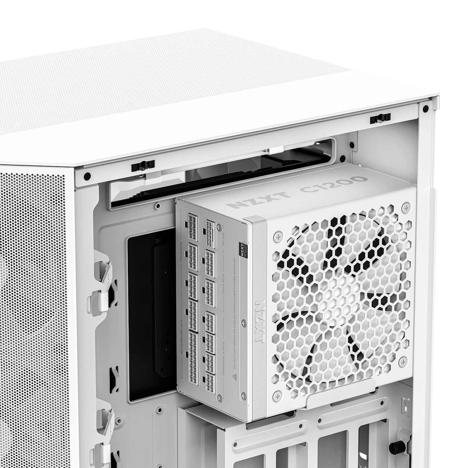 Interno di un case per computer bianco con un alimentatore. L'alimentatore ha una ventola a nido d'ape e il testo NZXT C1200 è visibile.