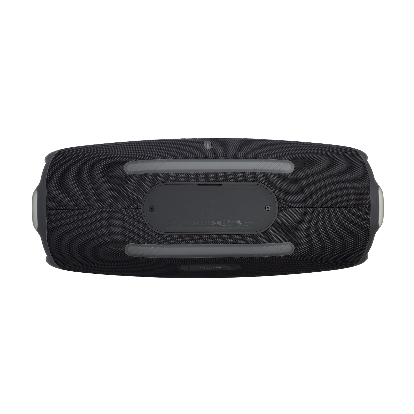 Se muestra un altavoz rectangular negro desde arriba. Tiene detalles grises y una superficie texturizada.