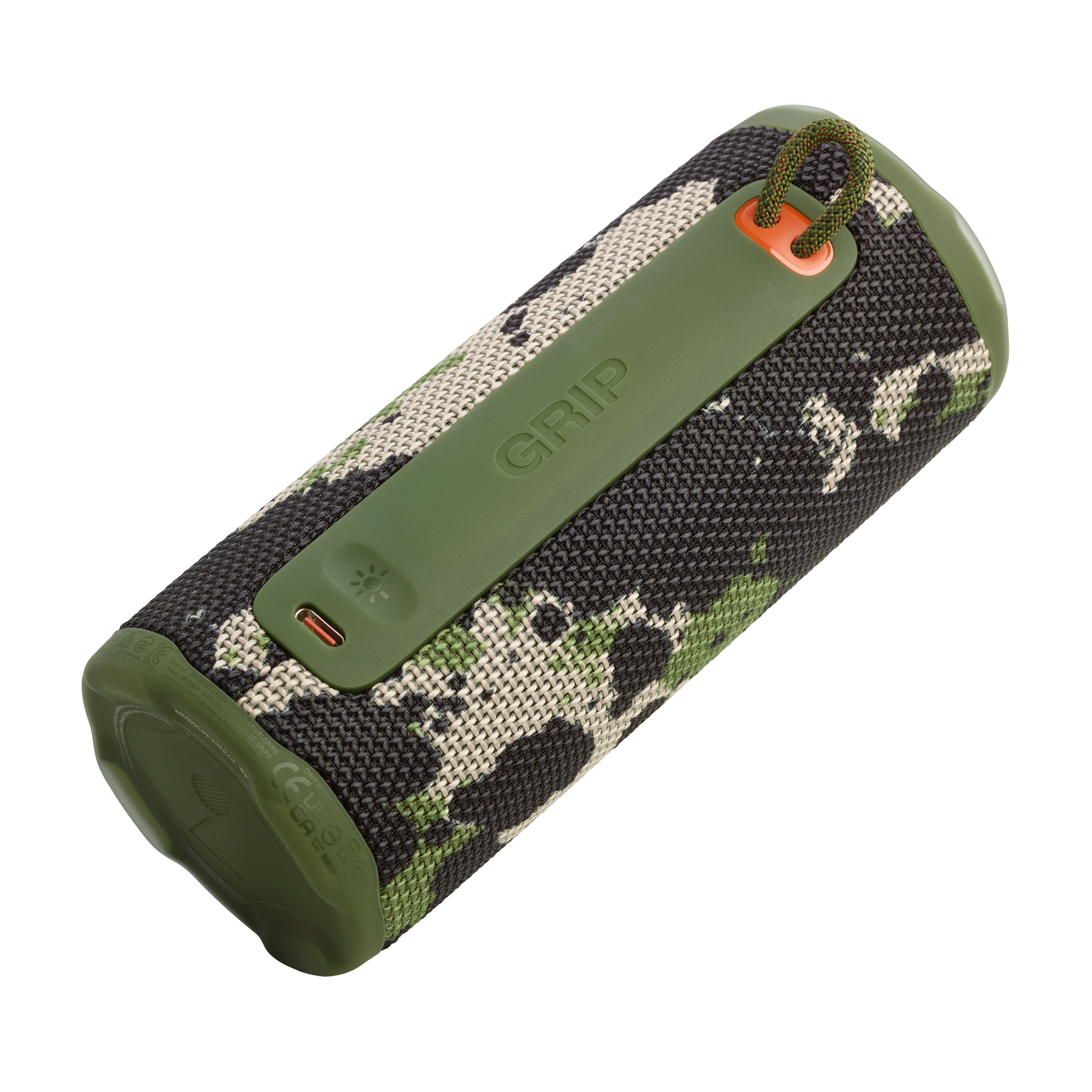 Un altavoz JBL camuflado con un asa verde. Tiene un puerto de carga y un lazo. El fondo es negro.