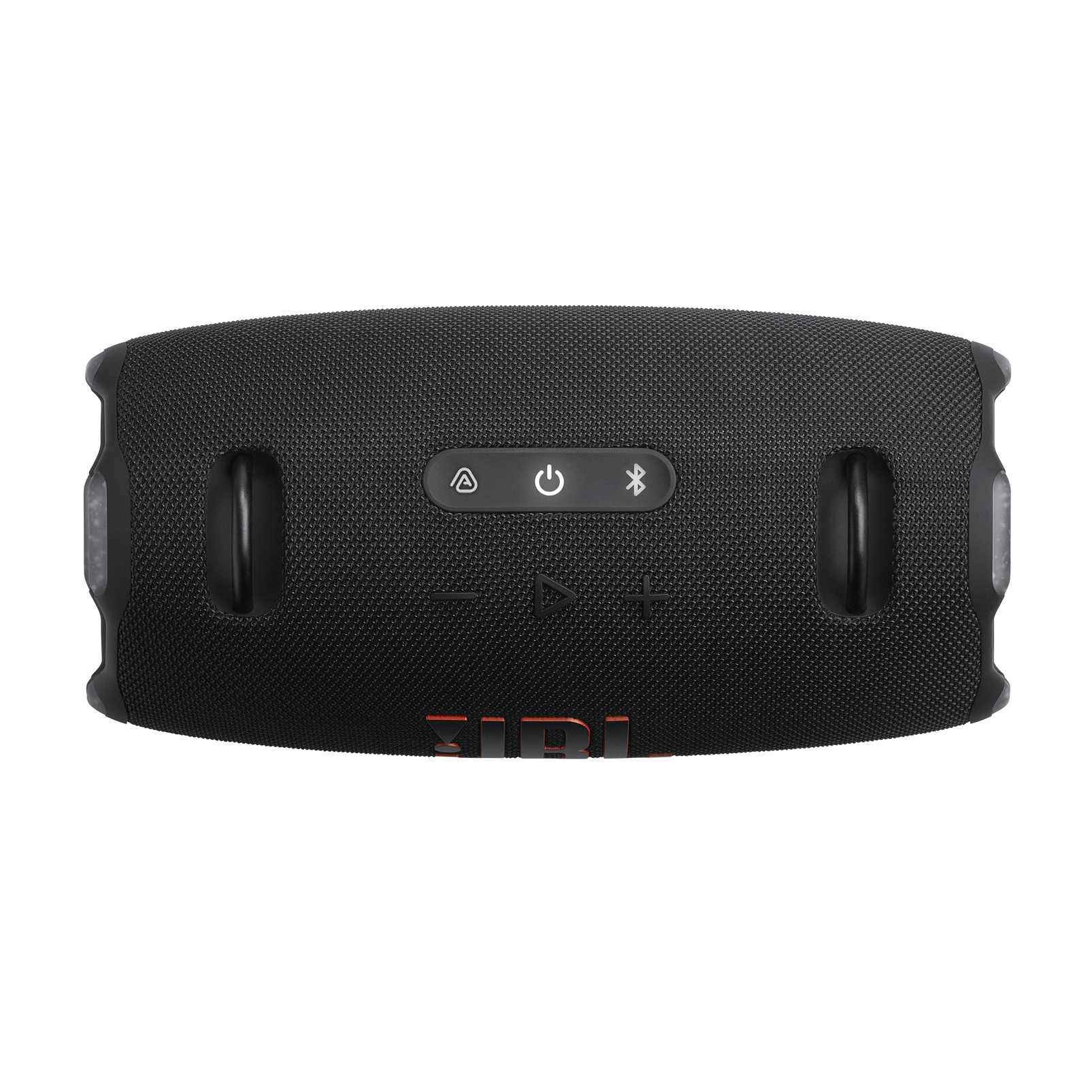 Altavoz JBL negro sobre fondo negro. Tiene botones de control y un asa a cada lado. El logotipo de JBL es visible.