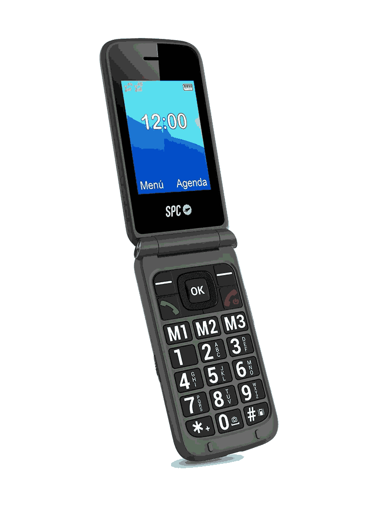 Un teléfono plegable gris con botones grandes está abierto, mostrando la hora 12:00. Tiene una pantalla clara con opciones de menú y agenda.