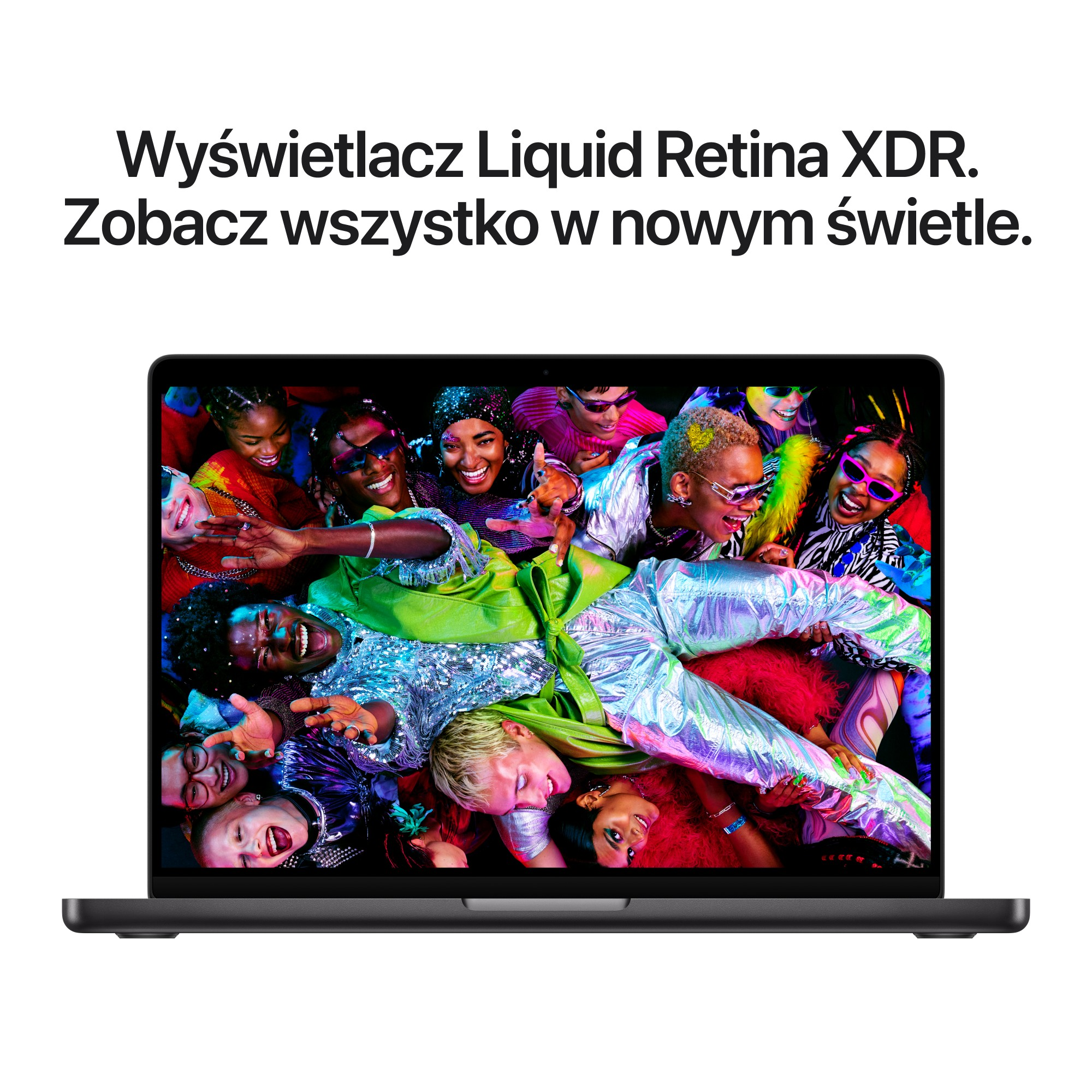 Laptop wyświetla grupę uśmiechniętych osób w kolorowych ubraniach i okularach przeciwsłonecznych. Scena jest żywa.