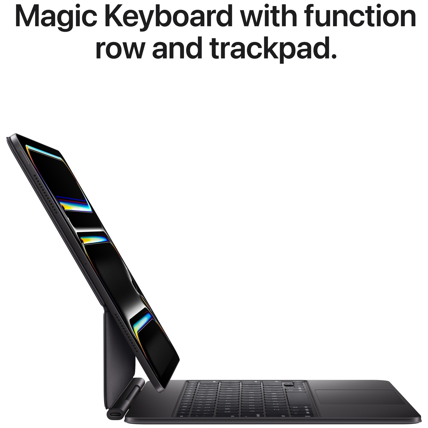 Zwart Magic Keyboard met iPad. Het toetsenbord heeft een trackpad en functierij. Het iPad-scherm toont een kleurrijk beeld.