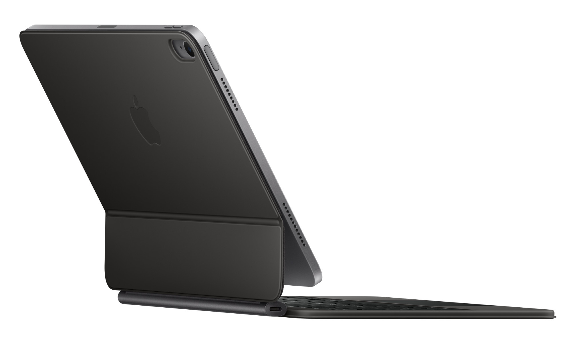Czarny iPad Pro z etui z klawiaturą, otwarty pod kątem, z logo Apple z tyłu i portami.