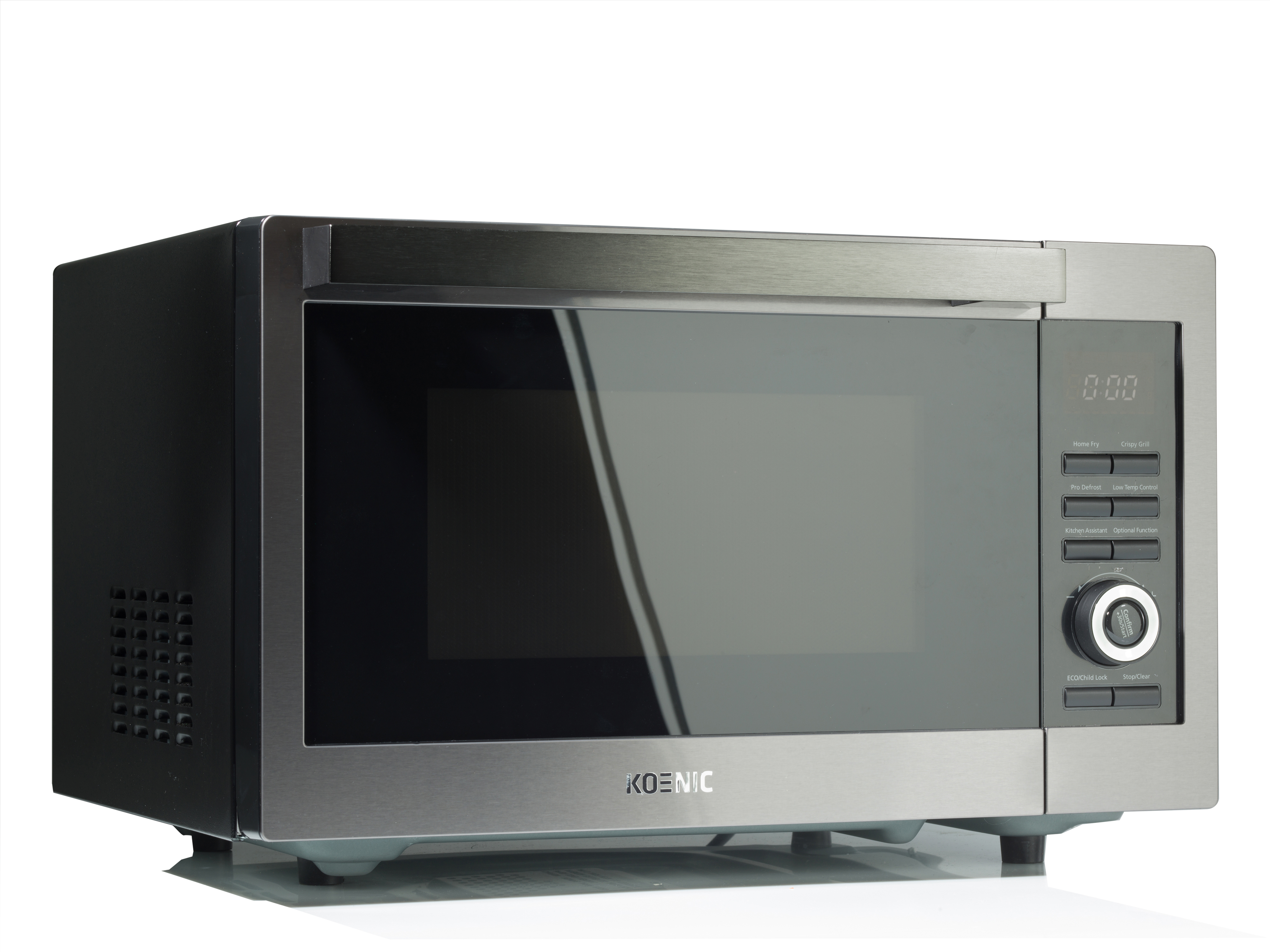 Srebrna kuchenka mikrofalowa Koenic na białej powierzchni. Posiada przyciski, wyświetlacz cyfrowy i okrągłe pokrętło.