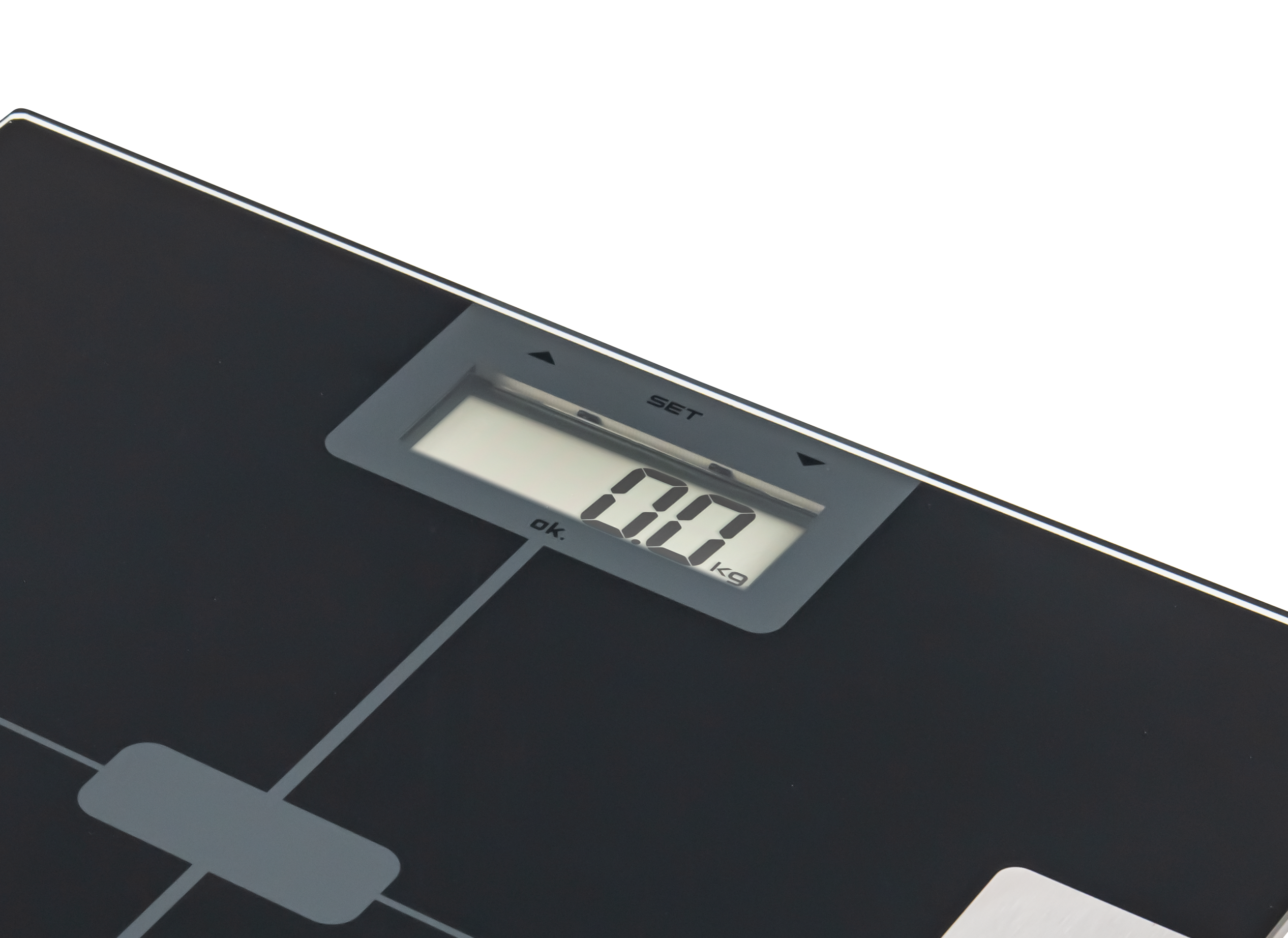 Cyfrowa waga łazienkowa z czarną powierzchnią i cyfrowym wyświetlaczem pokazującym 00 kg.