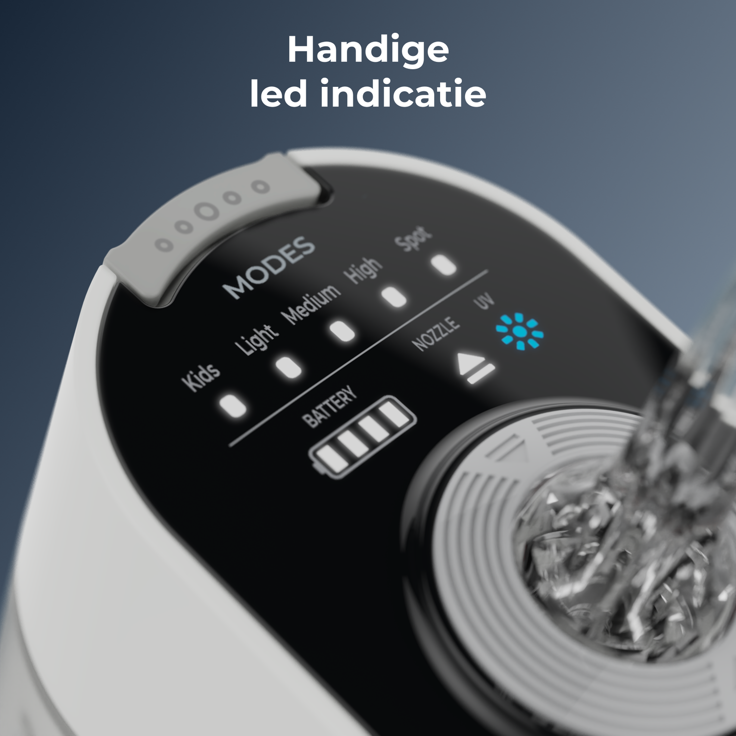 Close-up of a white device with a black display. Indicators for modes, battery level, and nozzle are visible. The UV light is on.