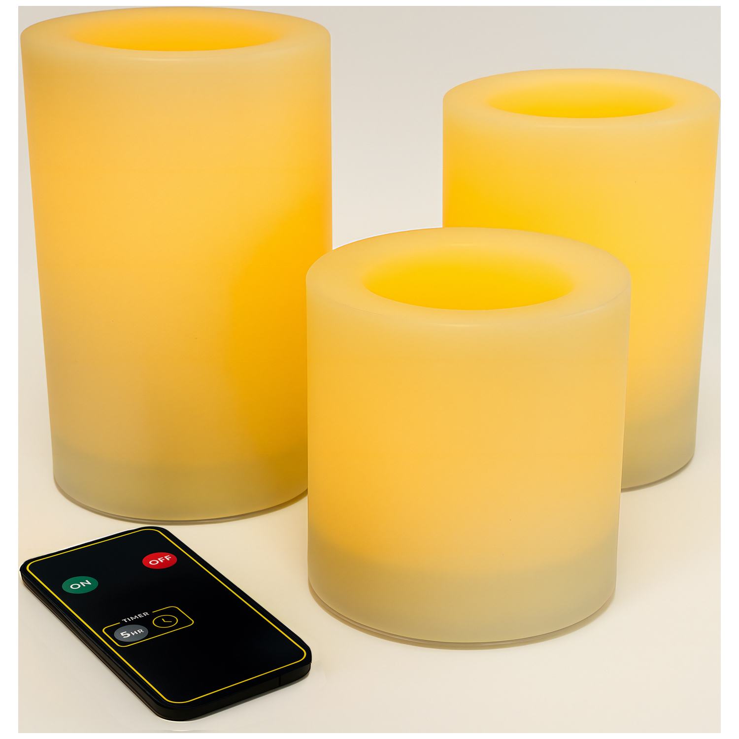 Three yellow, cylindrical LED candles with a remote control. The remote has on/off, timer, and a 5hr option.