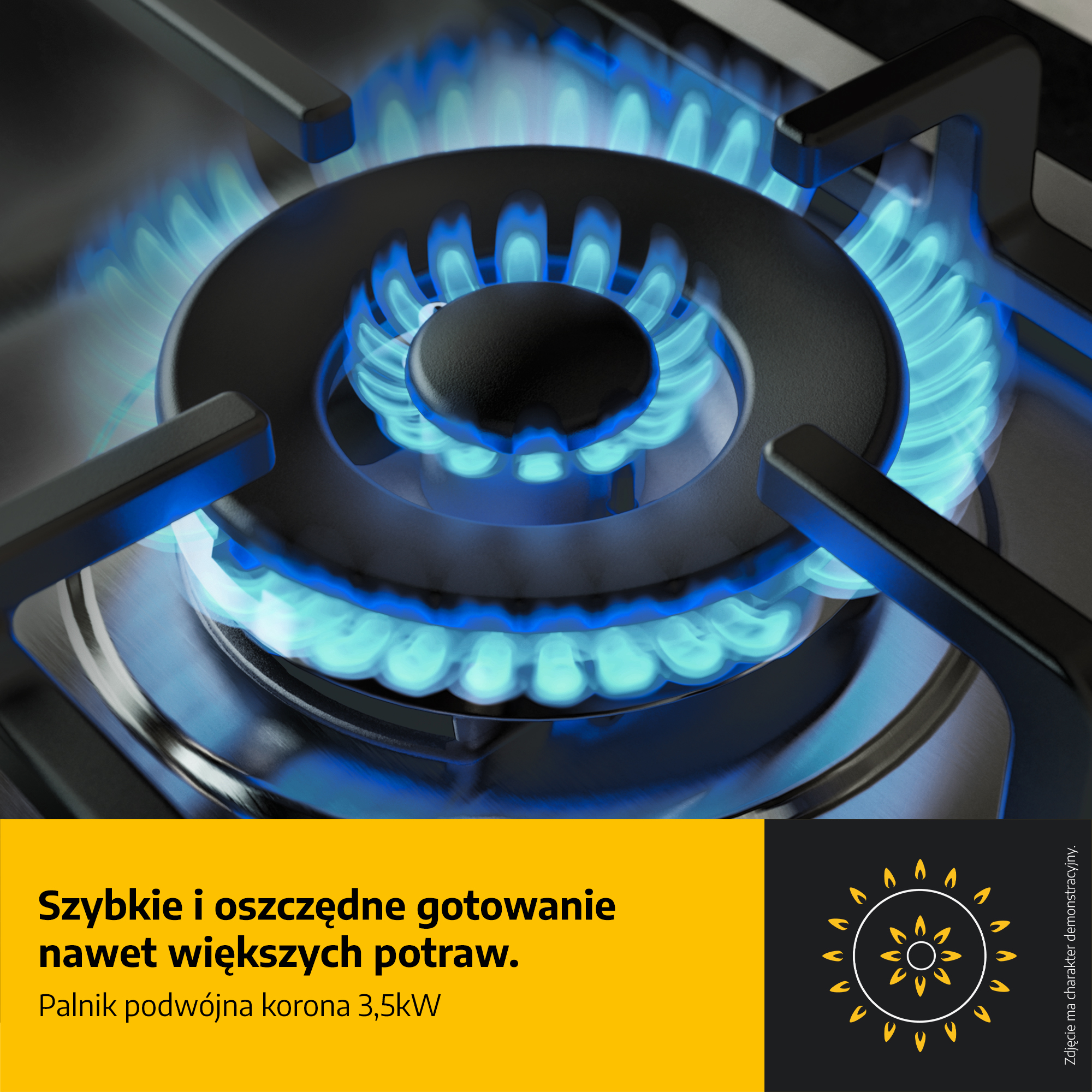 Zbliżenie palnika kuchenki gazowej z niebieskimi płomieniami. Palnik jest czarny, z żółto-czarnym polem tekstowym.