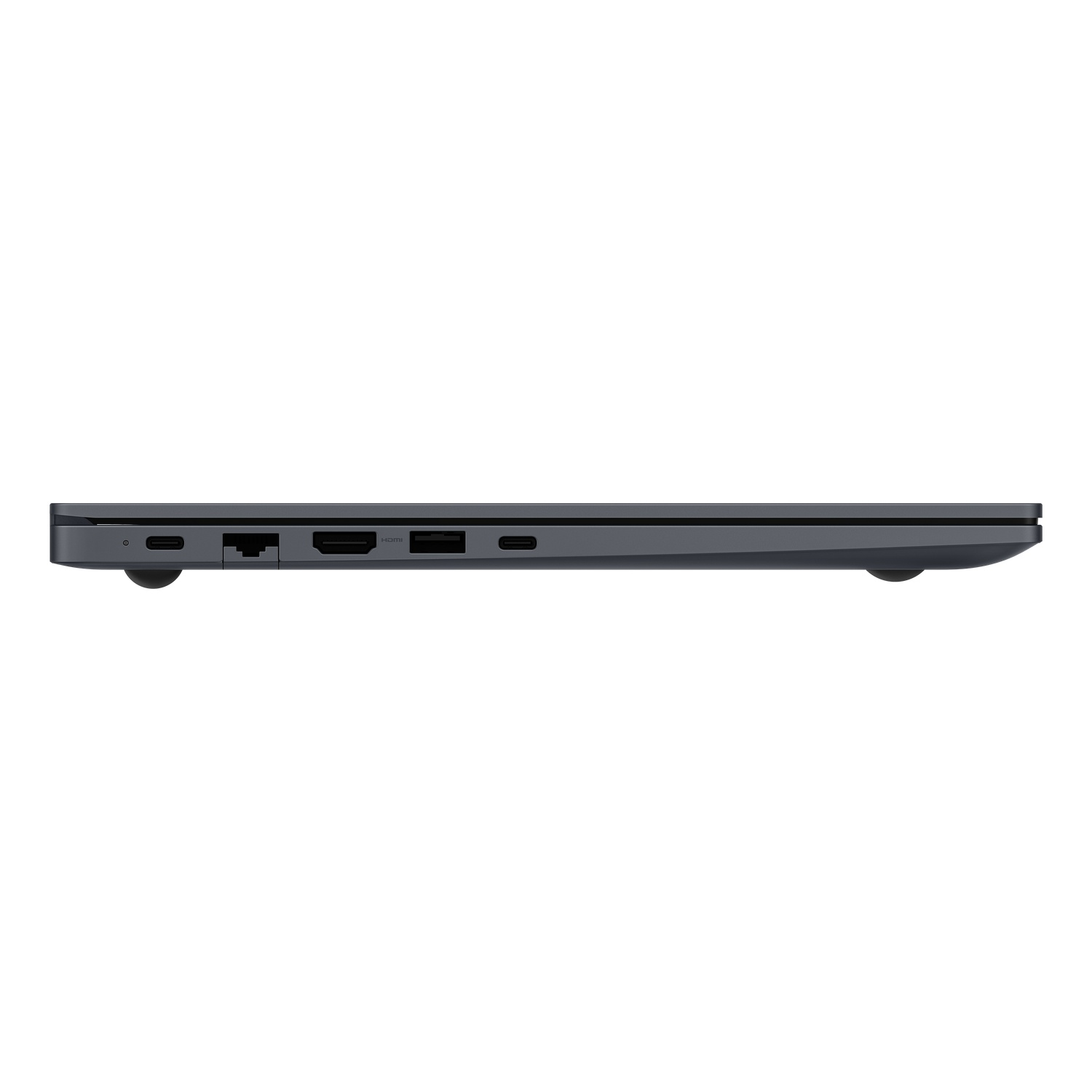 Side view of a dark gray laptop. Visible ports include USB-C, HDMI, and ethernet. The laptop is closed and sits on a white surface.