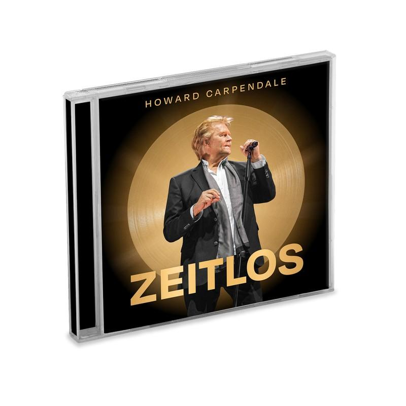CD-Cover. Howard Carpendale mit Mikrofon, im Anzug. Albumtitel 'Zeitlos'. Hintergrund golden.