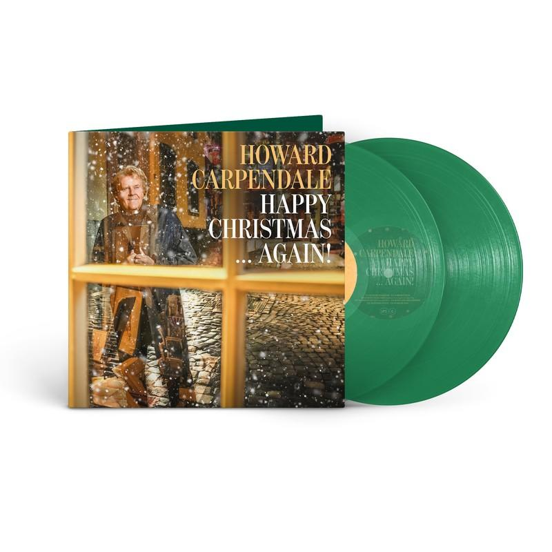 Albumcover: Howard Carpendale Happy Christmas Again. Grüne Schallplatten. Schnee fällt vor einem Fenster mit Carpendale.