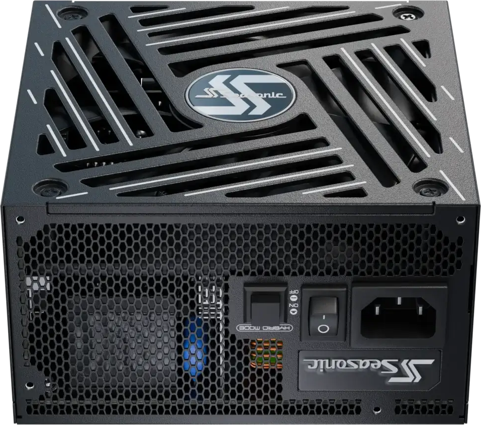 Une alimentation Seasonic noire. Elle possède une façade en maille, un interrupteur de mode hybride, un interrupteur marche/arrêt et une entrée d'alimentation.