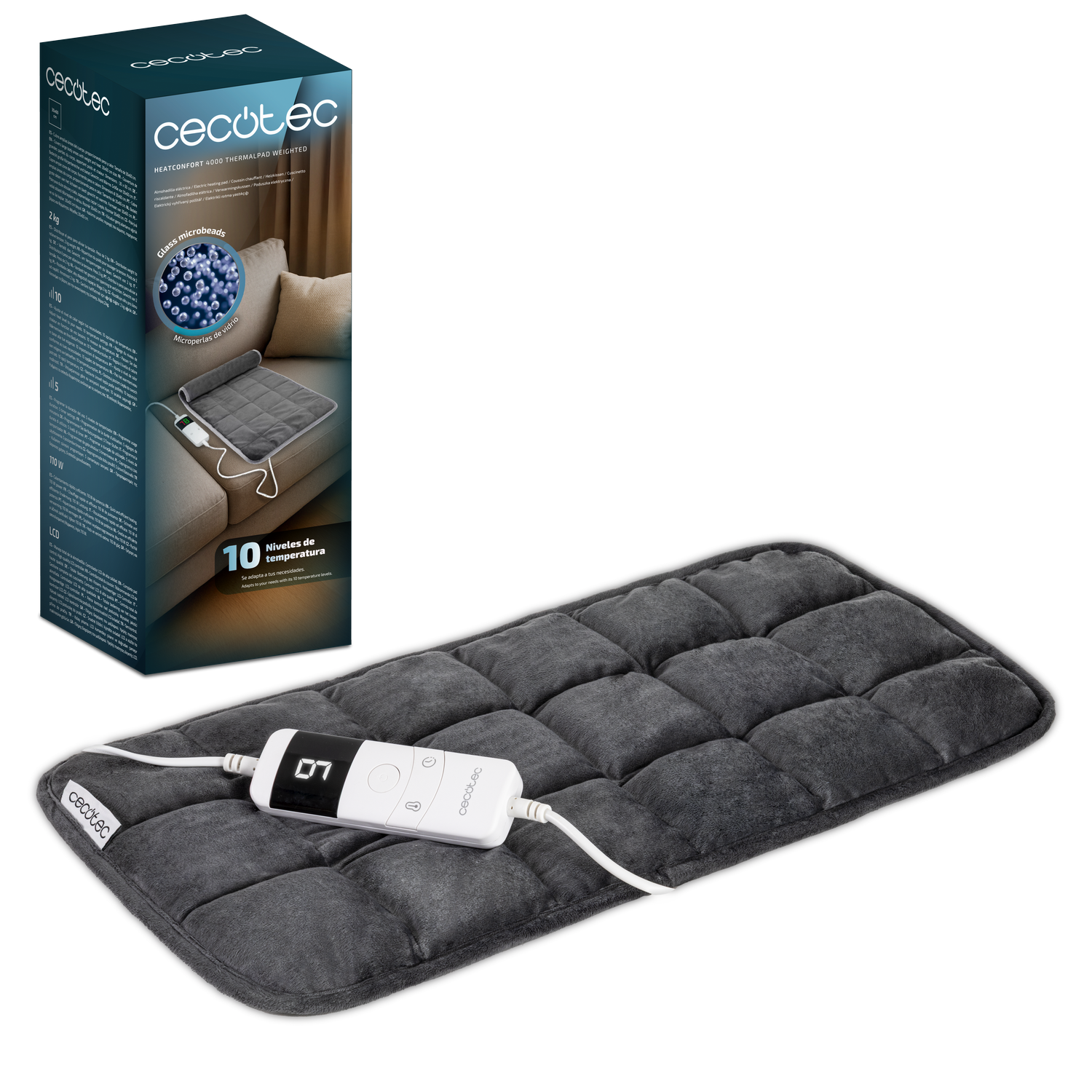 Se muestra una almohadilla térmica gris con un panel de control y su caja, mostrando detalles del producto y la marca.