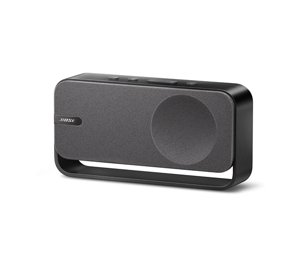 Un altavoz Bose negro con malla de altavoz gris y base curva. Hay tres botones en la parte superior.