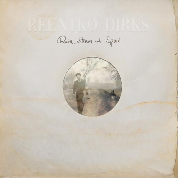 Albumcover: REENTKO DIRKS, Rain, Steam and Speed. Ein Mann geht auf einem Pfad, hält eine Gitarre, in einem Kreis. Sepia-Töne.