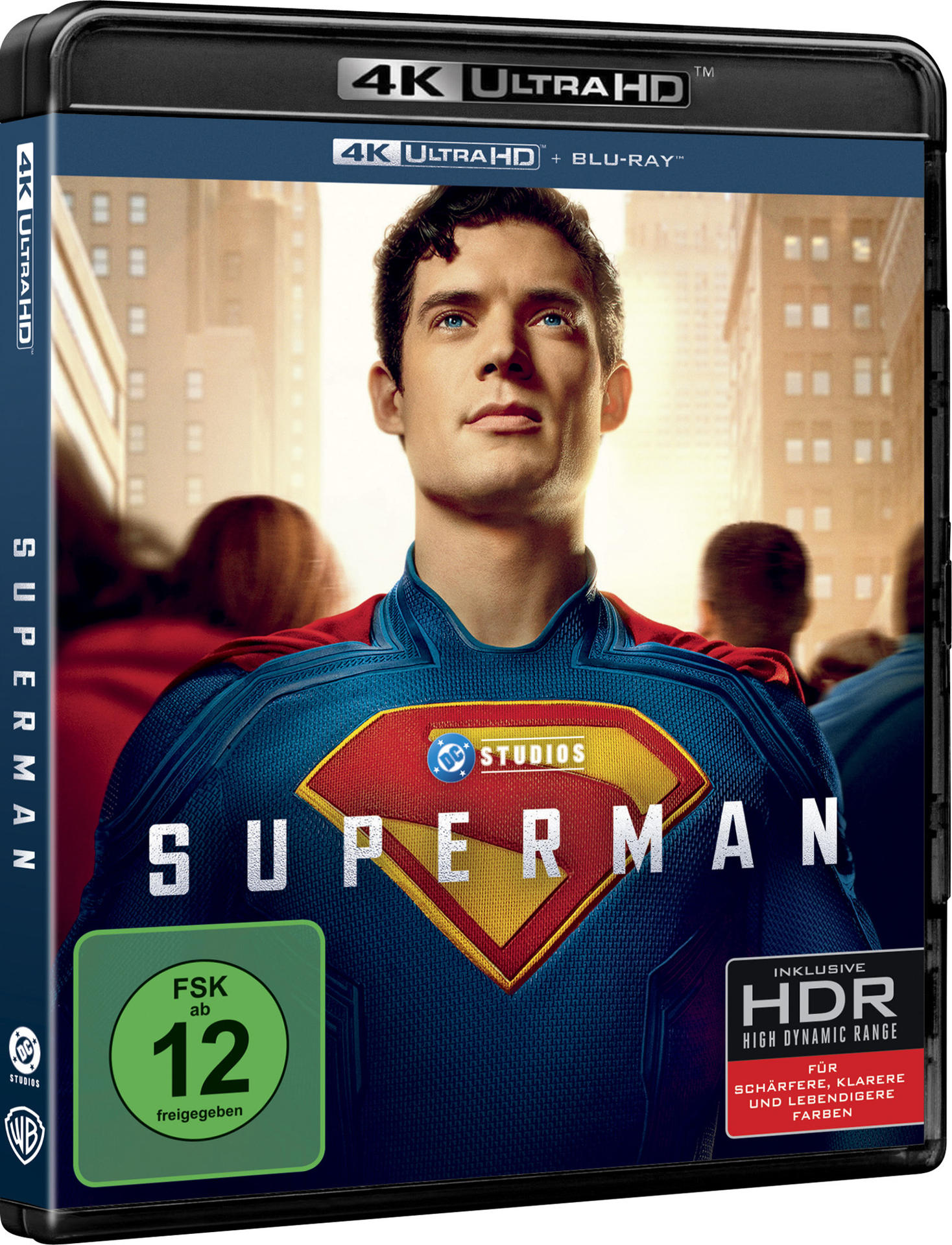 Superman Blu-ray-Cover. Mann im Anzug, Superman-Logo. Gebäude im Hintergrund. 4K Ultra HD- und HDR-Logos.
