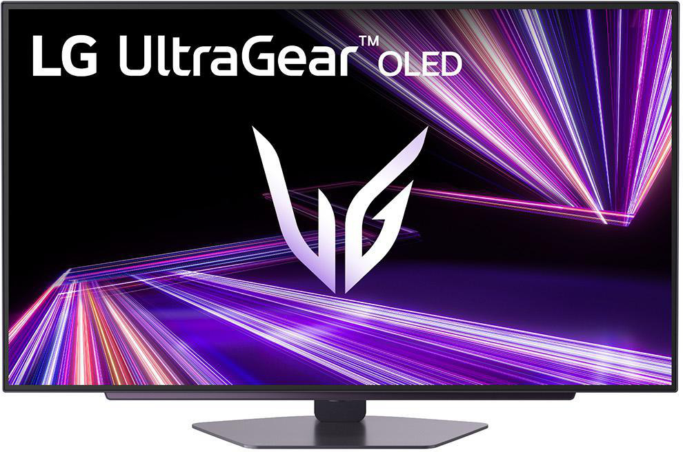 LG UltraGear OLED TV. Schwarzer Bildschirm mit weißem LG-Logo und stilisierten lila Lichtspuren. Der Fernseher steht auf einem grauen Ständer.