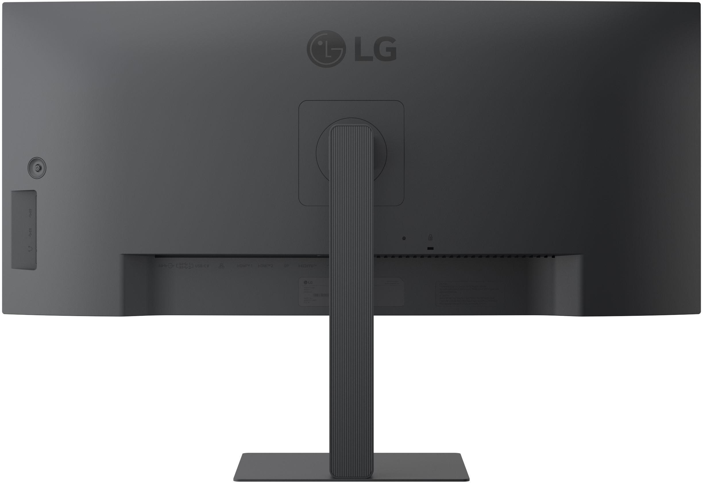 Rückseite eines grauen LG-Monitors. Anschlüsse wie HDMI, USB-C sind sichtbar. Der Monitor ist auf einem Ständer montiert.