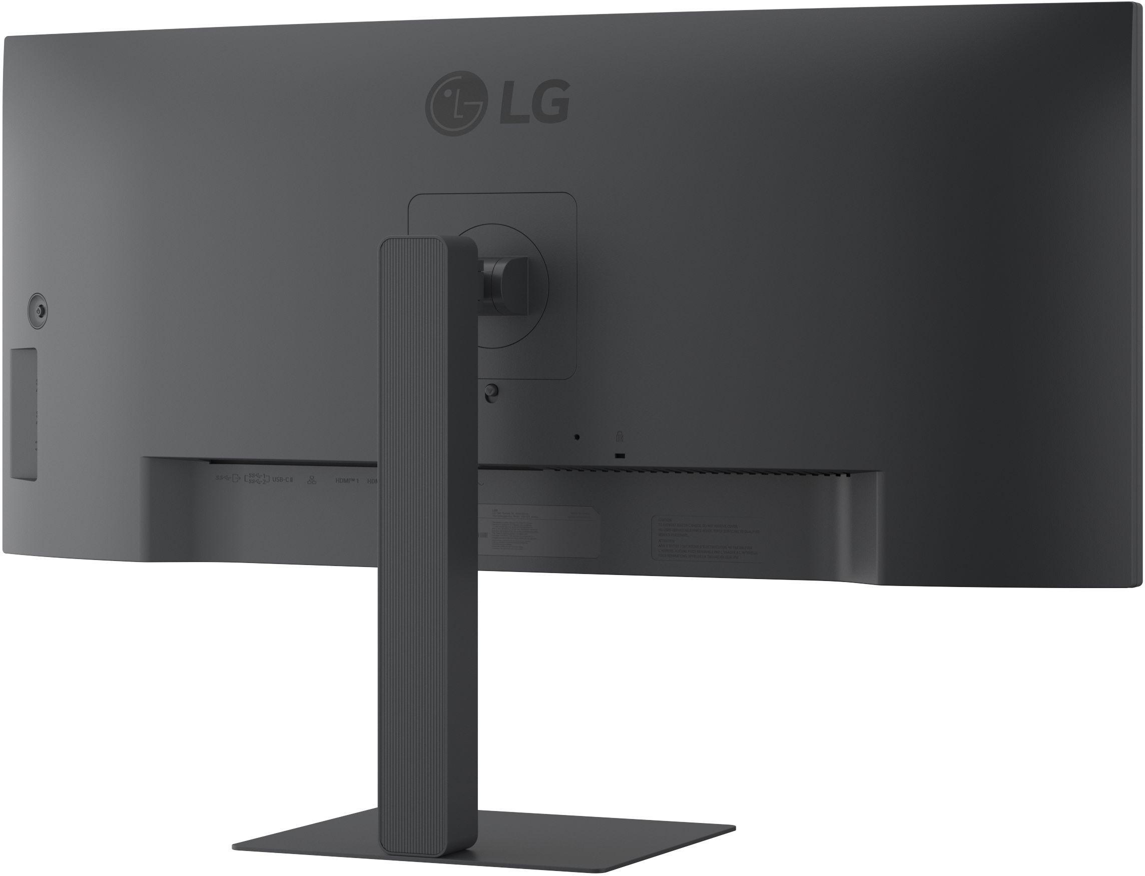 Die Rückseite eines grauen LG-Monitors wird gezeigt. Ein Ständer stützt den Monitor, mit dem LG-Logo oben.