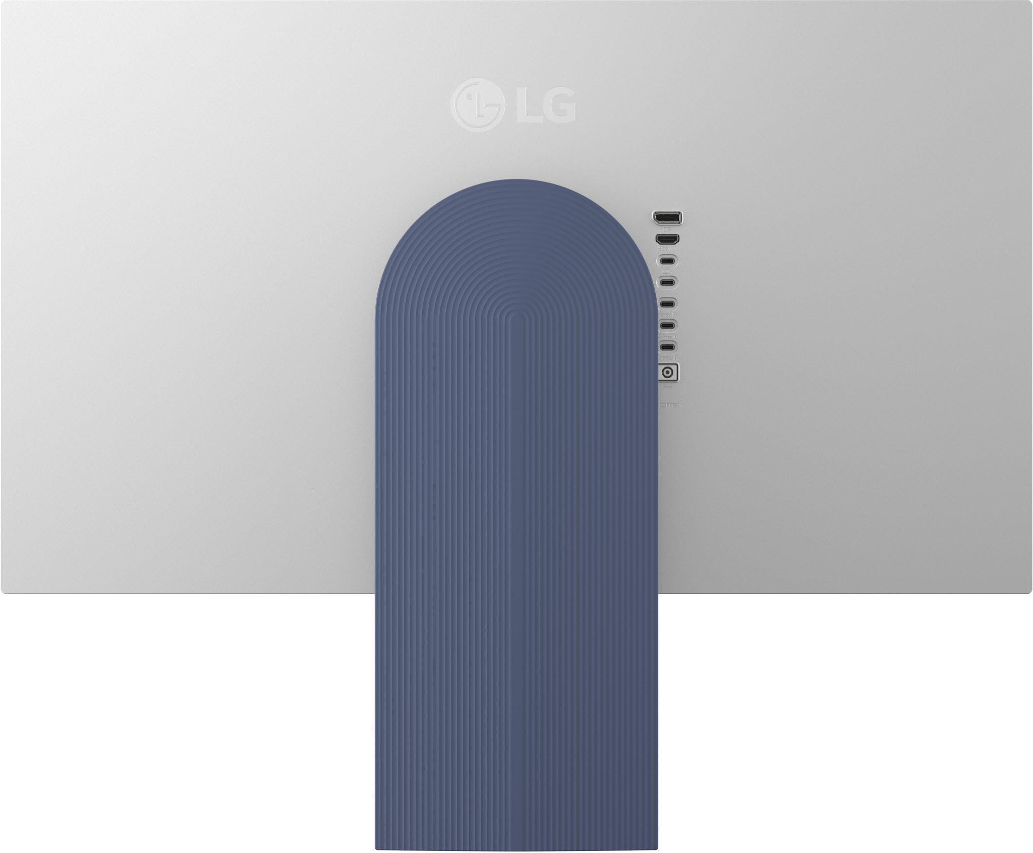 Die Rückseite eines Computermonitors mit LG-Logo, Anschlüssen und blauem Ständer. Der Bildschirm ist hellgrau.