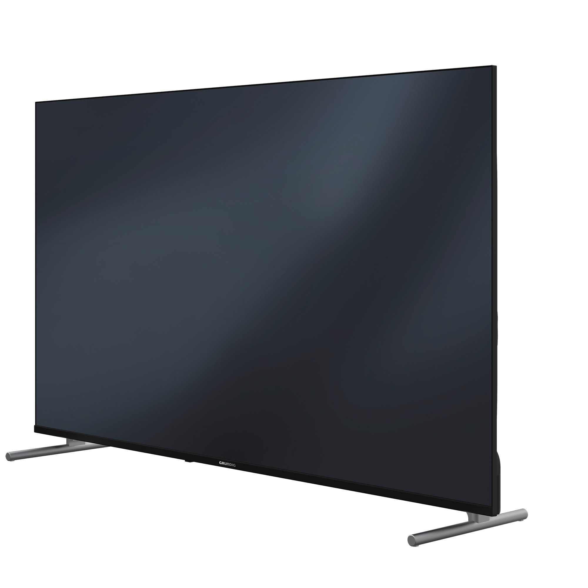 Gümüş bir ayaklık üzerinde büyük, koyu renkli bir TV ekranı. Ekranda Grundig markası yer alıyor.
