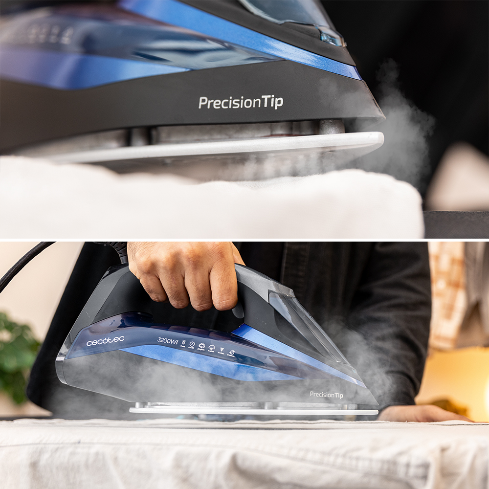 Una plancha con vapor está sobre una tela blanca. Una mano sostiene la plancha. La plancha es negra y azul con 'PrecisionTip'.