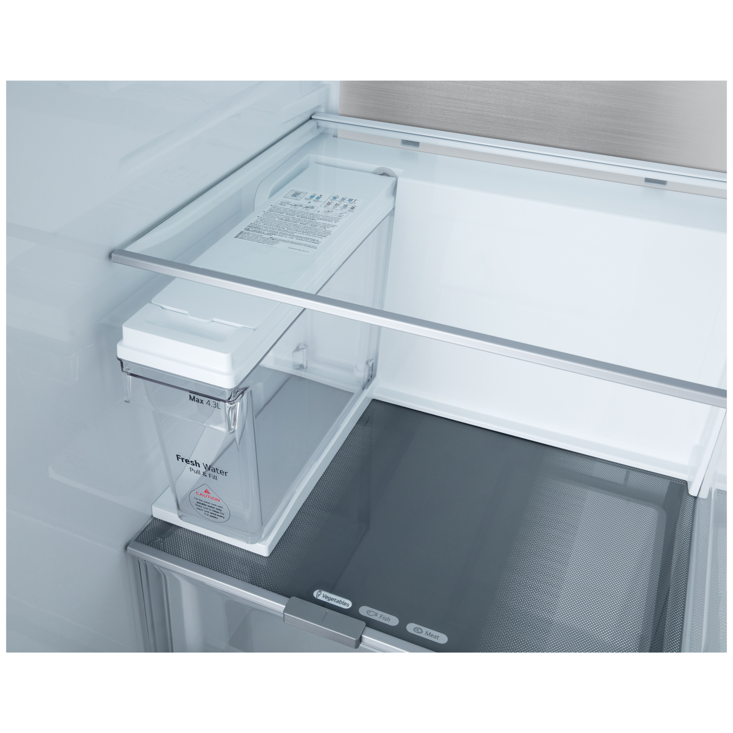 Inside a refrigerator, a transparent water container sits above a drawer. Labels indicate 'Fresh Water' and capacity. A gray shelf is below.