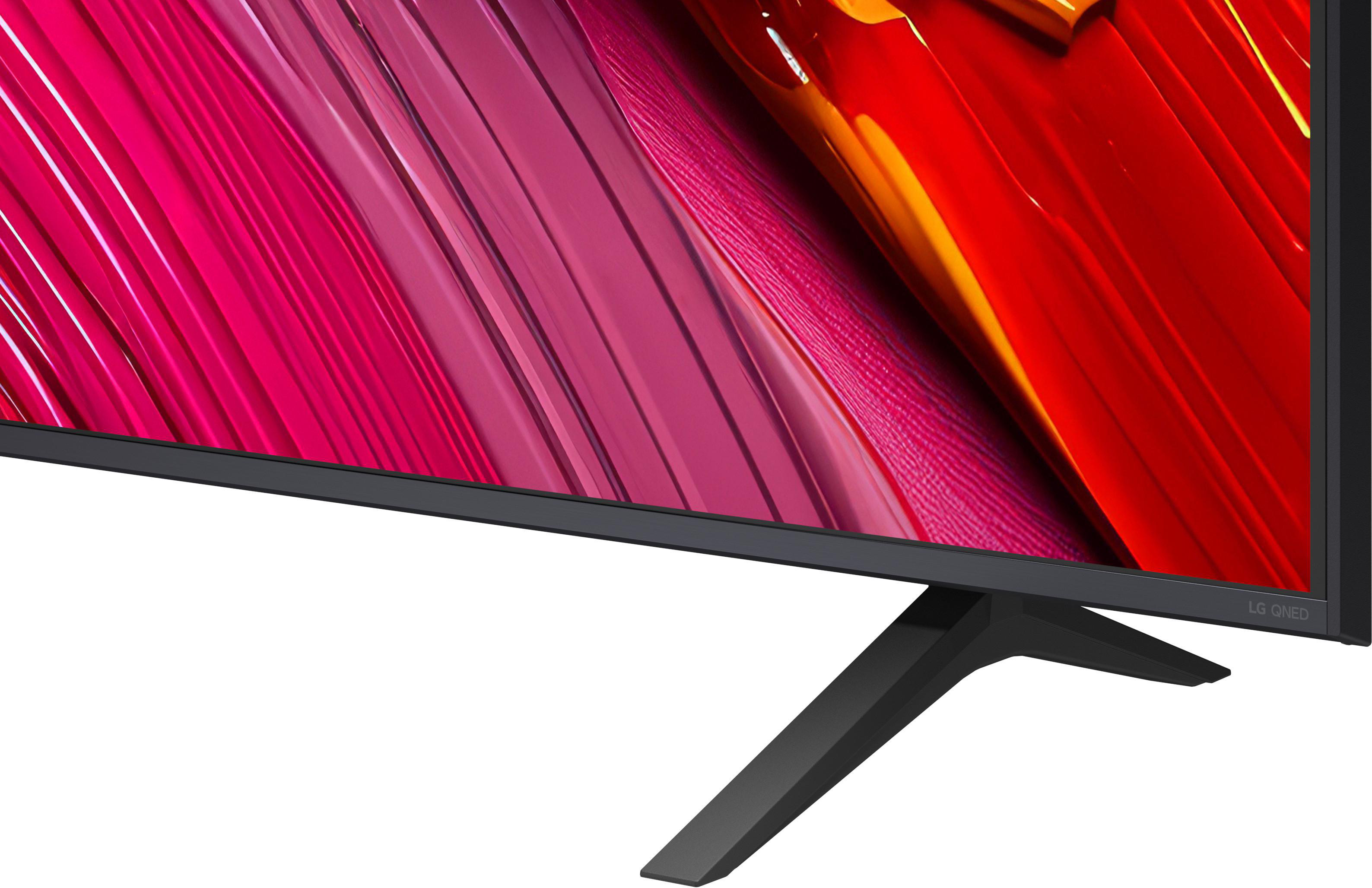 TV-Bildschirm mit rosa und roter abstrakter Kunst. Ein schwarzer Ständer stützt den Bildschirm.