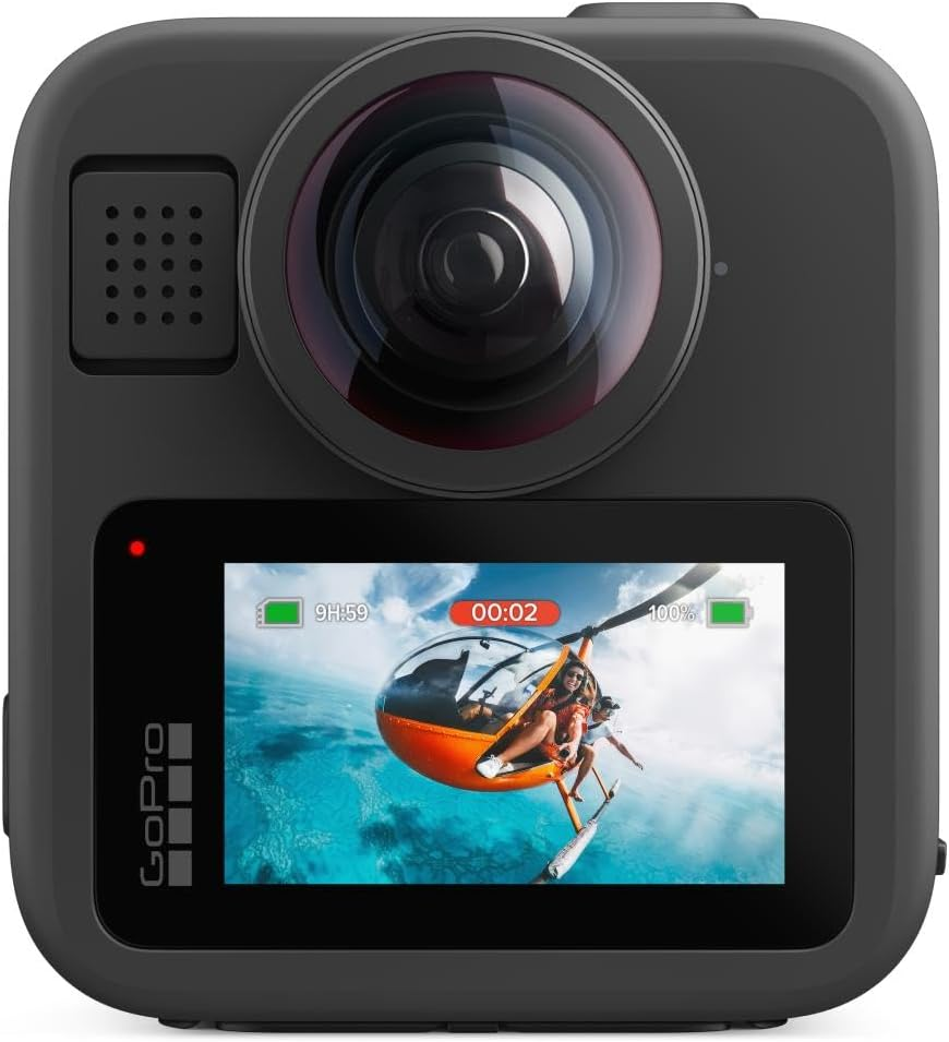 Cámara GoPro que muestra una escena de helicóptero en su pantalla. La cámara tiene una lente grande y una pantalla pequeña. Batería al 100%.
