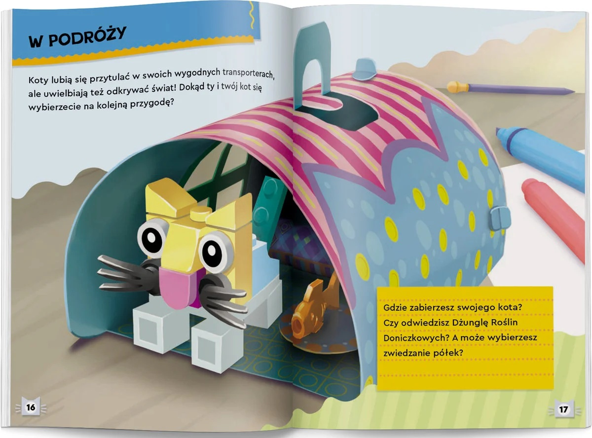 Kot z klocków jest wewnątrz kolorowej konstrukcji, z długopisami z boku. Scena pochodzi z książki.