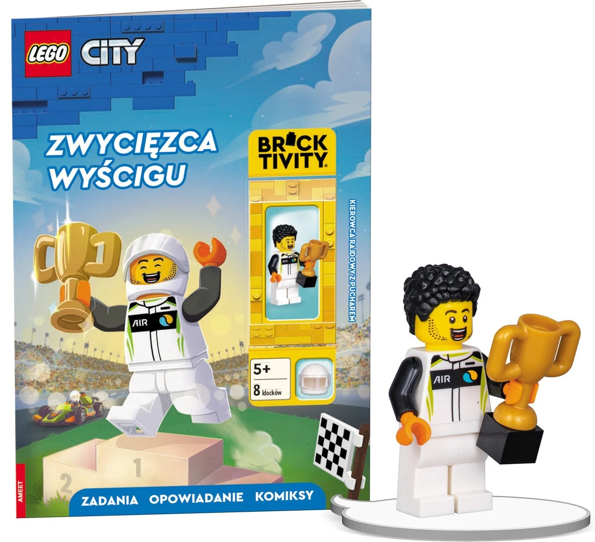 Zestaw Lego City z zawodnikiem Lego z trofeum. Zestaw zawiera książkę i figurkę Lego trzymającą złoty puchar.