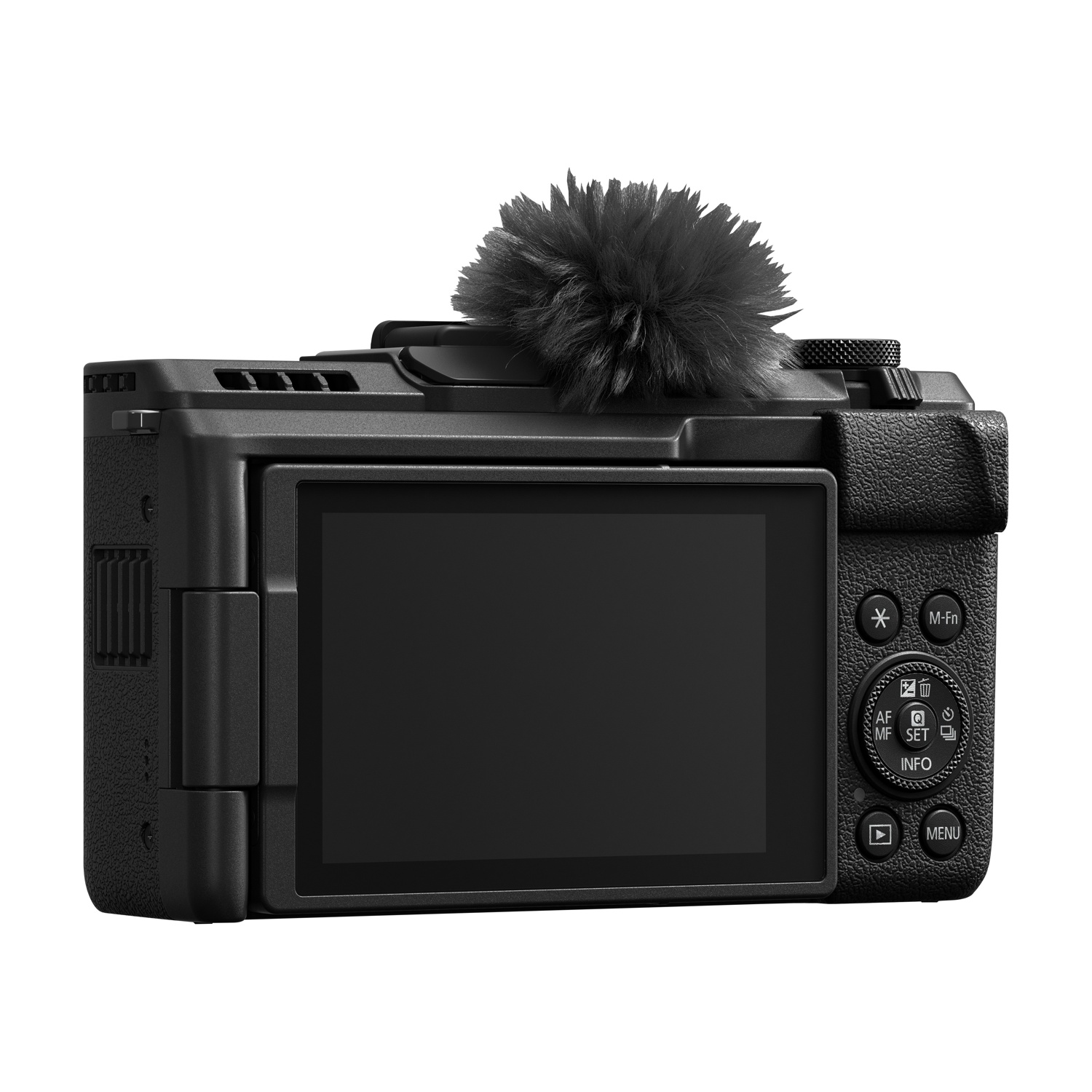 Fotocamera nera con schermo e comandi. Un microfono è sopra. È su sfondo bianco.