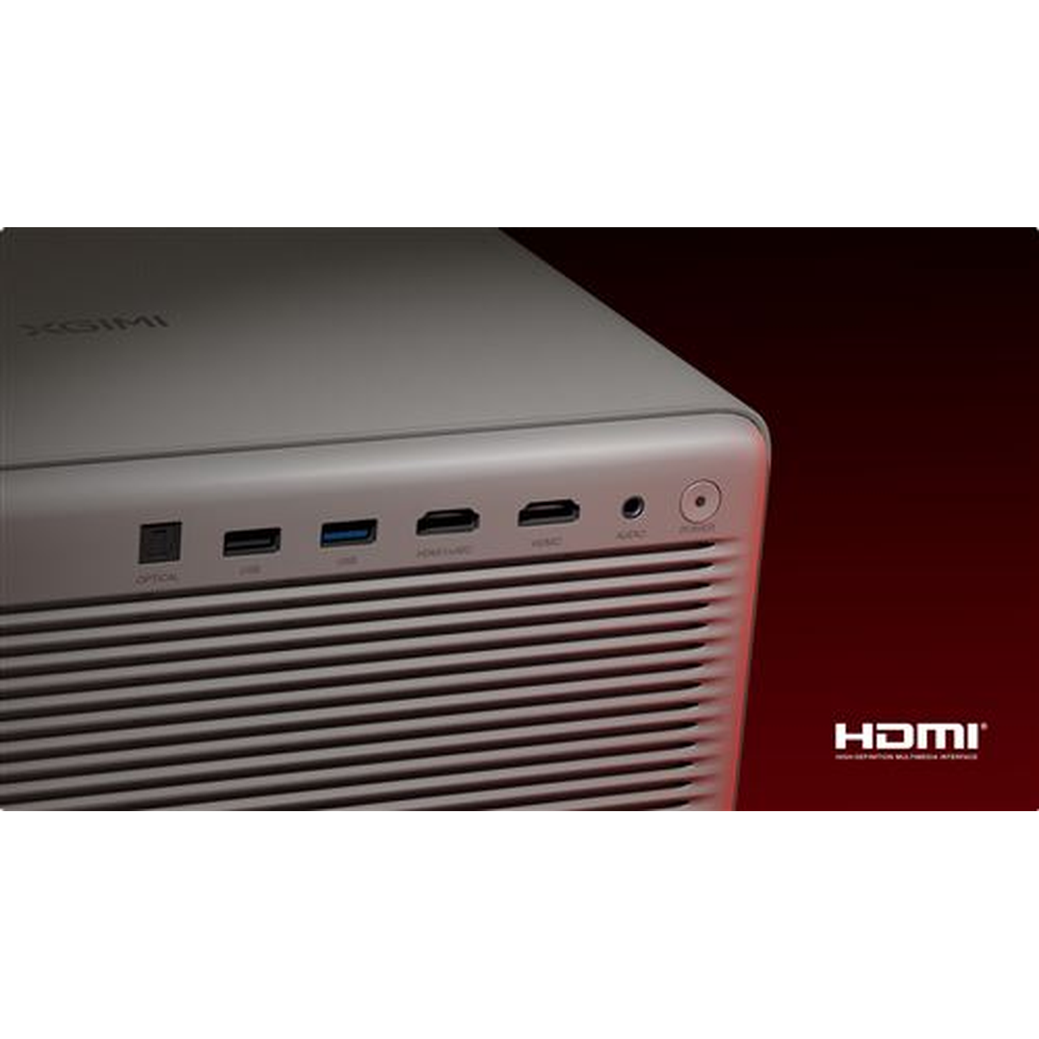 A gray projector with ports, a ventilation grill, and the HDMI logo on a red background.