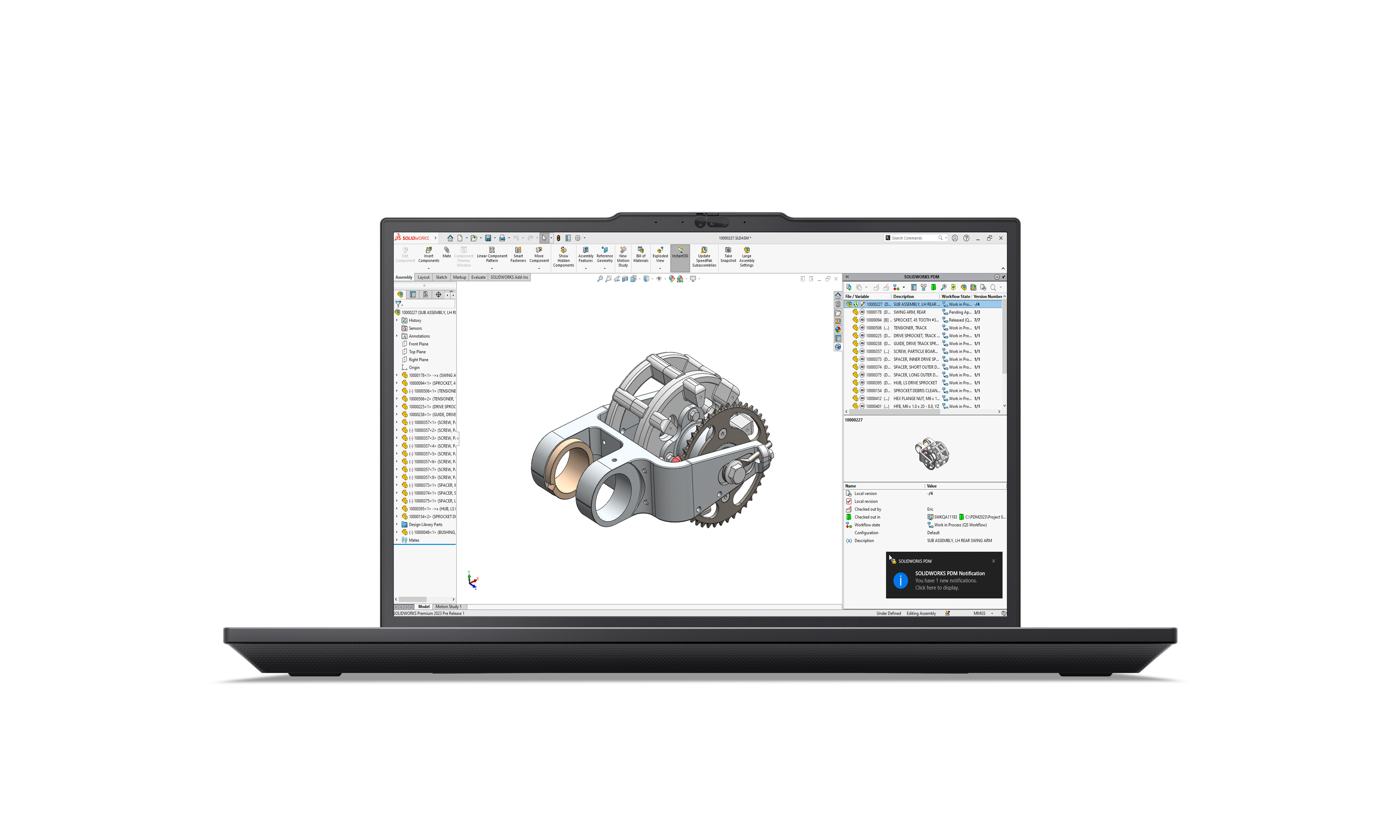 Ein Laptop zeigt ein 3D-Modell von mechanischen Teilen. Der Bildschirm zeigt eine CAD-Softwareoberfläche.