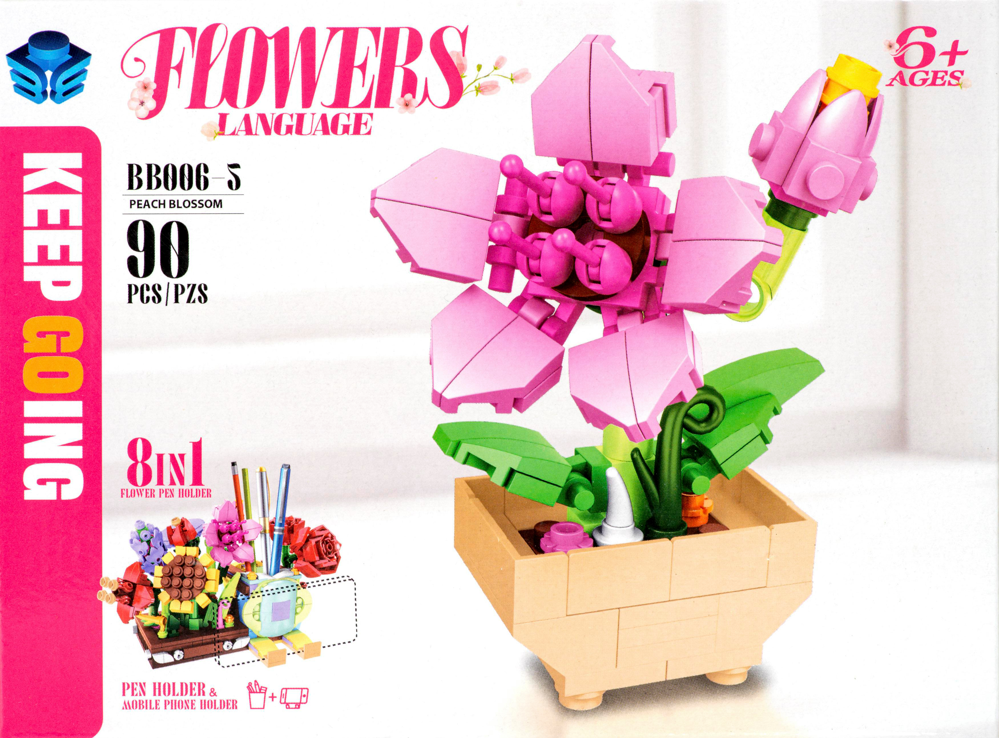 Ein rosa Lego-Blumenset in einem beigen Topf. Die Box zeigt ein Blumenset mit Stiften und Anleitungen.