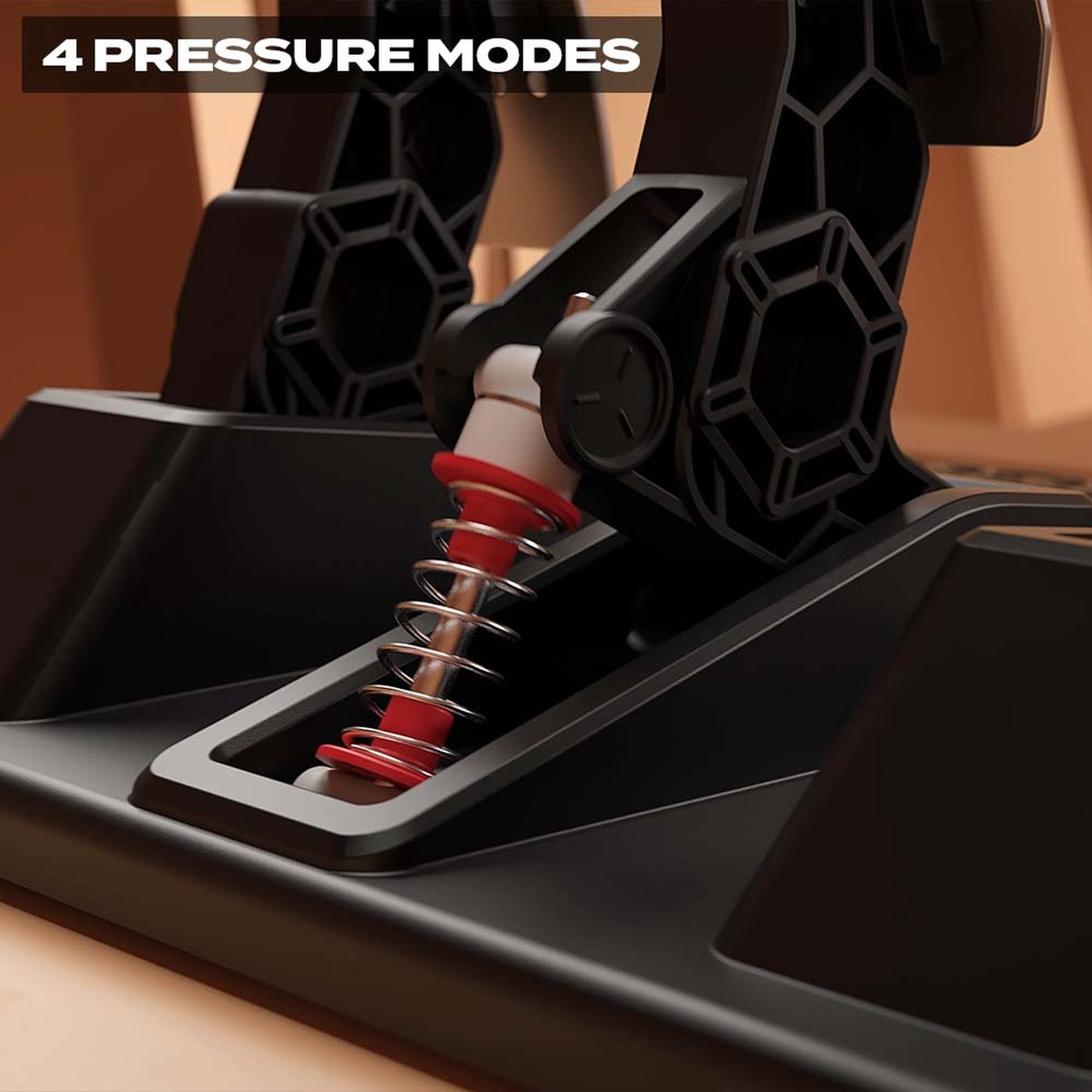 Close-up van een zwart apparaat met een veer en rode details. De tekst '4 PRESSURE MODES' staat bovenaan. Achtergrond is een houten oppervlak.