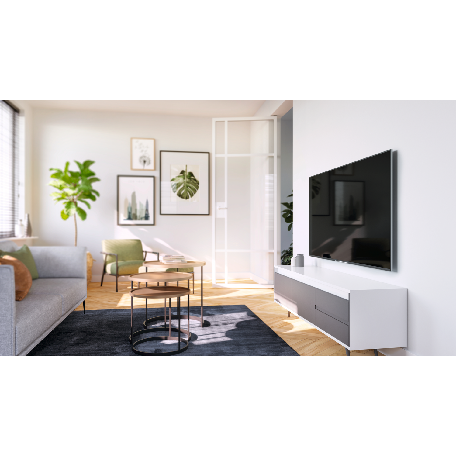 Living room with a gray sofa, TV, and coffee tables. Artwork on the wall. Natural light through the blinds.