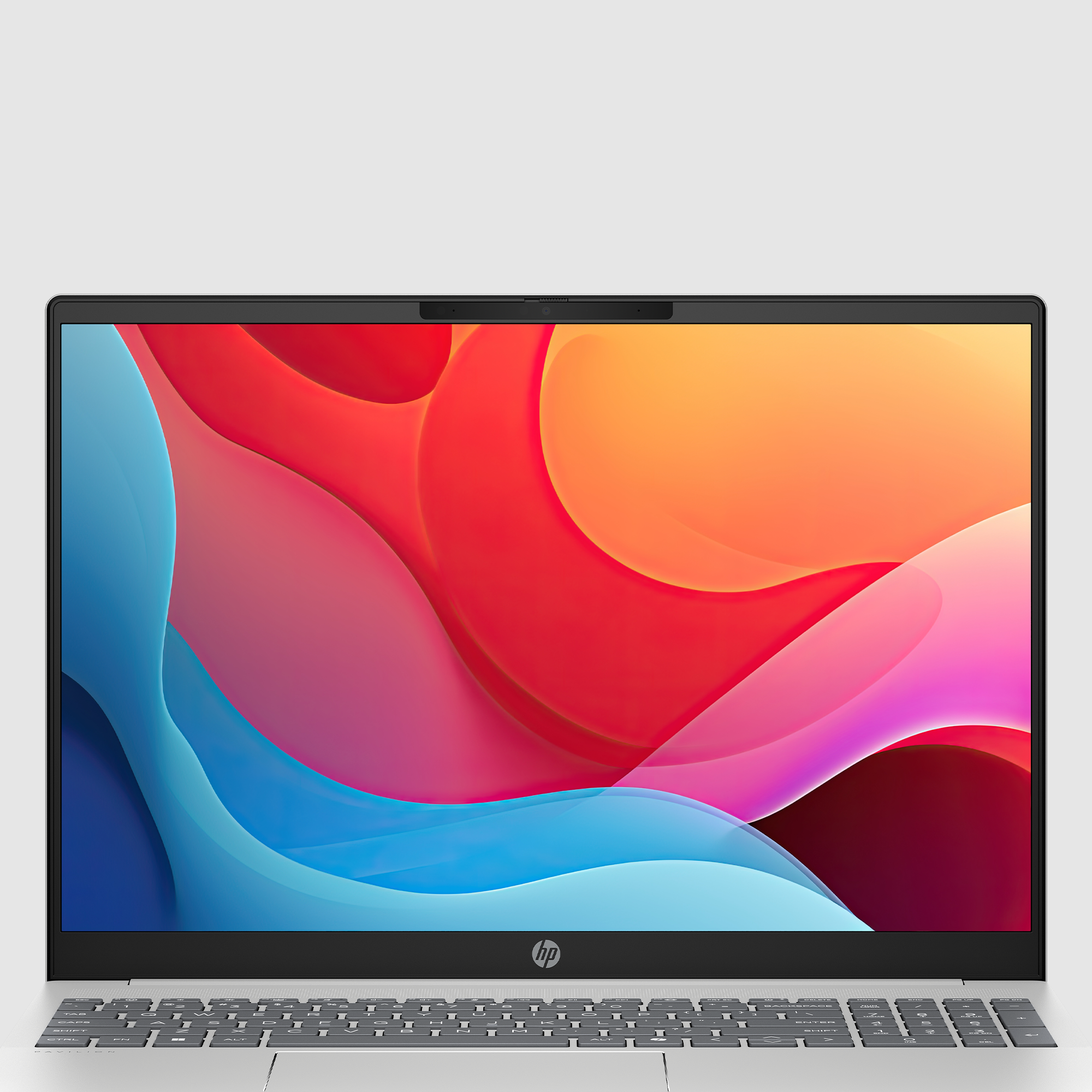 Laptop z kolorowym, abstrakcyjnym wyświetlaczem. Klawiatura jest widoczna. Tło to gradient od bieli do jasnoszarości.