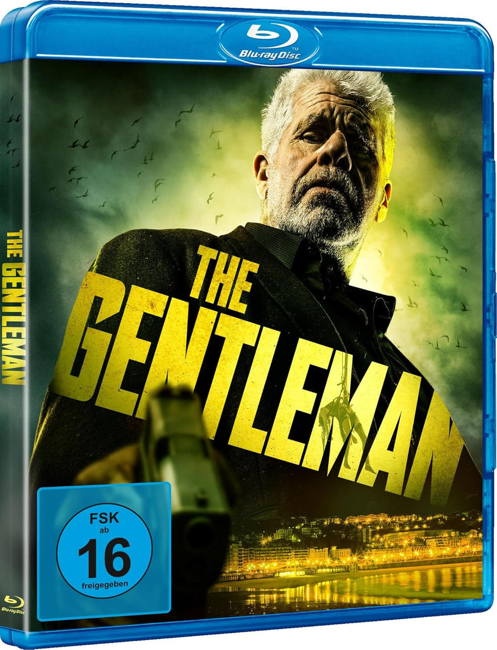 Blu-ray-Cover von 'The Gentleman'. Zeigt einen Mann mit ernstem Blick, der eine Waffe hält. Gelber Titeltext. Hintergrund Vögel und Stadt.