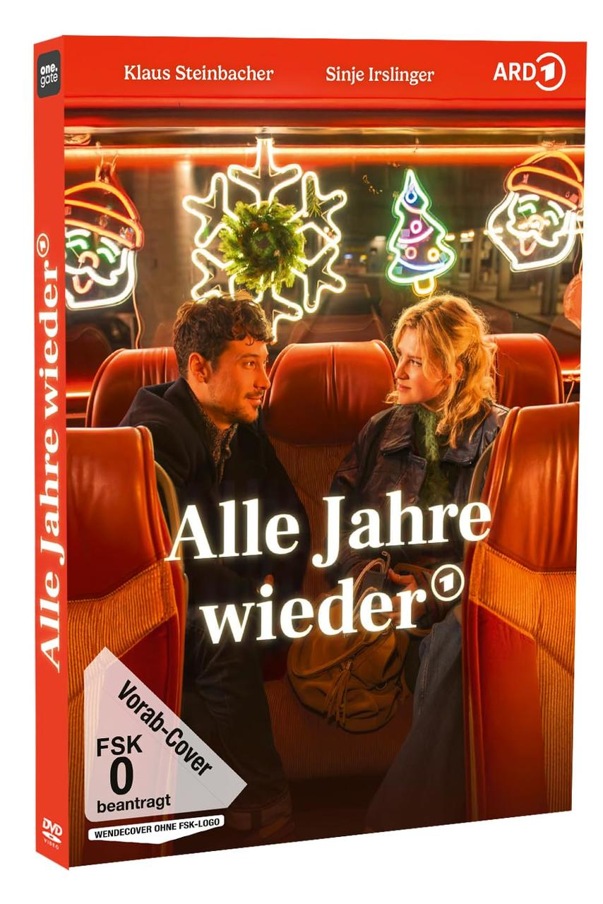 DVD-Cover. Ein Mann und eine Frau in einem Zug mit Weihnachtsbeleuchtung. Titel: Alle Jahre wieder.