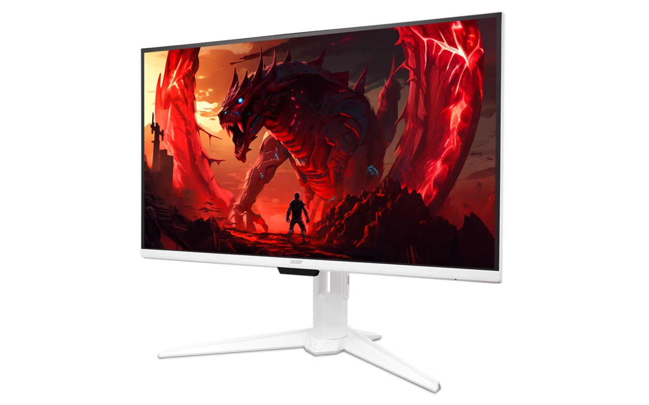 Egy fehér Acer monitor egy piros sárkányt, egy kis figurát és szaggatott vörös kőzetképződményeket jelenít meg. A monitor fehér állványon van.